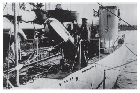 Loading an exercise torpedo aboard the U3,  U boat Type IIA in a pre-war photo ..............................
