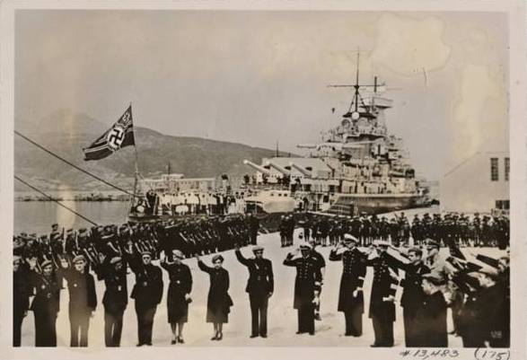 The Panzerschiff &quot;Admiral Graf Spee&quot; departs for her Atlantic voyage from the port of Ceuta in the Spanish Morocco: Falangists greet the warship and her crew .....................................................