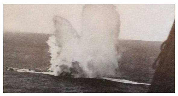 The Liberator achieved a near hit with one of the depth charges ...........................................