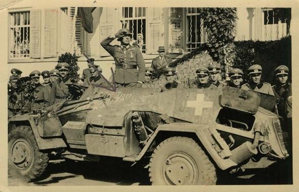 Panzerspähwagen Sd Kfz 221 (Tiger) turretless as makeshift stage during a military parade - Poland 1939 ...........................................