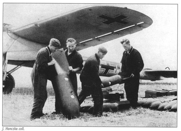 Ground crew preparing the bombs to be loaded in a Do-17 E .................................