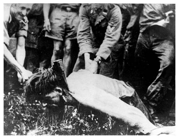 SS-Oberscharführer Walter Weber beheads a captured Yugoslav partisan, Idrijske Krnice, June 11, 1944 ...........