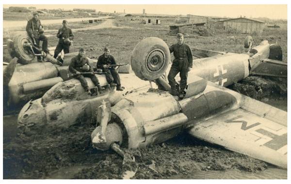 A medium bomber Ju-88 capsized in the mud during the landing.....................
