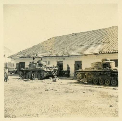 A German armored formation in a rest/assembling area; in the photo two Pz Kw III Ausf. G (it seems)...........................................