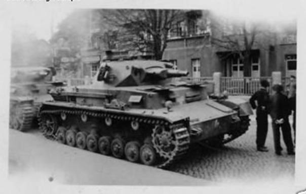 A pair of Pz Kw IV Ausf. B / C stopped in a Polish town .............................