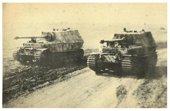 Ferdinand heavy tank-hunters from sPz.Jäg.Abt 654, with their characteristic camouflage scheme, move to their starting position...............