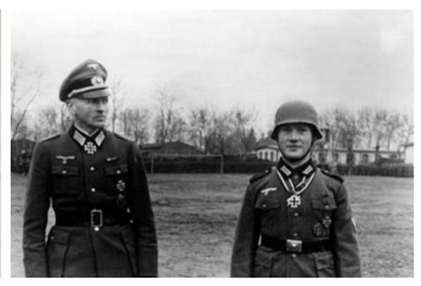Hubert Brinkforth (right) after the awarding of the Knight's Cross to the Iron Cross. His battalion commander Freiherr von Hardenberg is on the left.................................