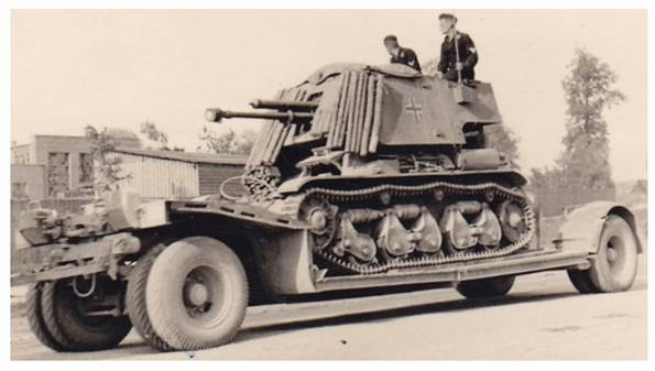 A Sd.Ah.115 trailer loaded with a 4,7 cm PaK(t) auf Panzerkampfwagen 35R(f).........