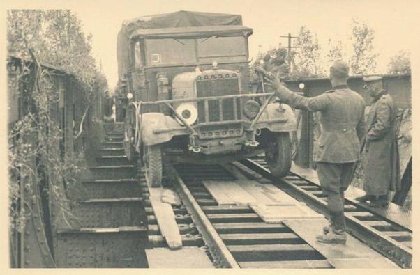 A Henschel 33 D 1? crossing a railway bridge with arrangement of circumstances..............