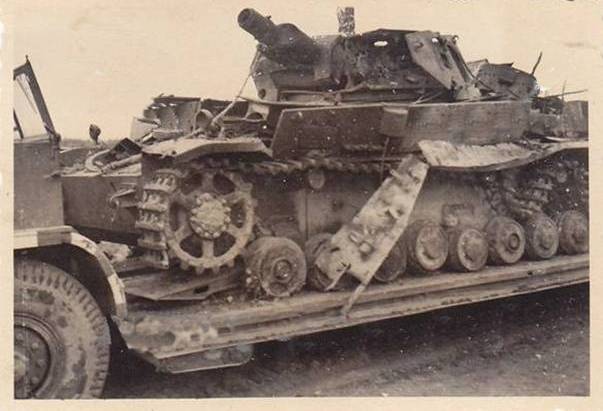 A Pz Kw IV Ausf. D destroyed during the early stages of Barbarossa is retrieved from the battlefield............