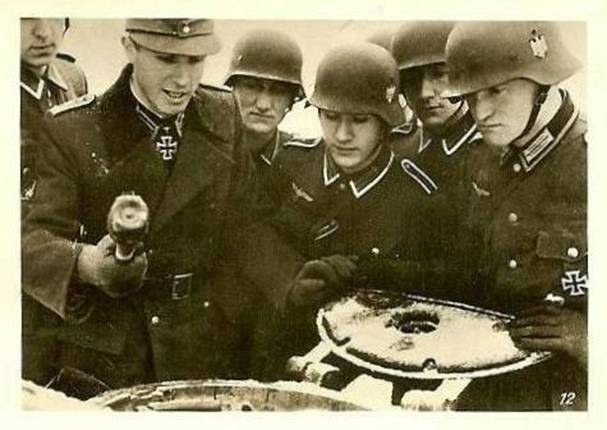 Oberleutnant Rast (left) during a demonstration.....................................