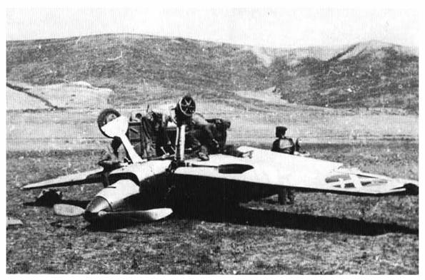 Bad Entrance In Alar del Rey (Nogales); Ofw.Reinhard Seiler lands his Bf 109B-2 6-30 headfirst, but comes off the machine with only slight jerks...................