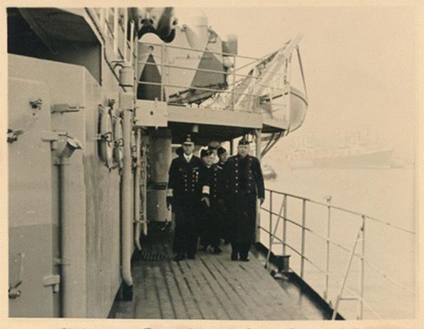 Kapitän z.S. Helmuth Brinkmann accompanies Admiral Lütjens on the deck of the Prinz Eugen.....................
