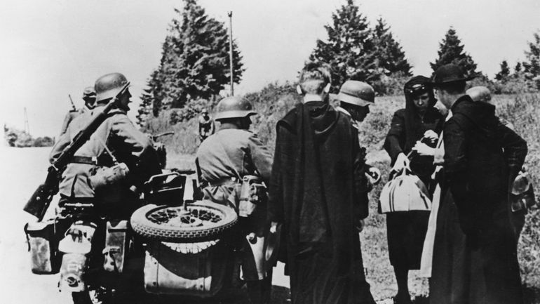 Germans inspecting Belgian citizens in may 1940