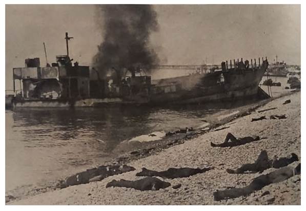 Surrounding the destroyed landing craft lie the casualties of the failed operation....................
