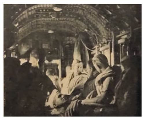 Interior of a Ju-52, when flying over the sea, the troops have their life jackets on...................