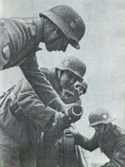 source unknown:spansish anti-tank crew checking their pak