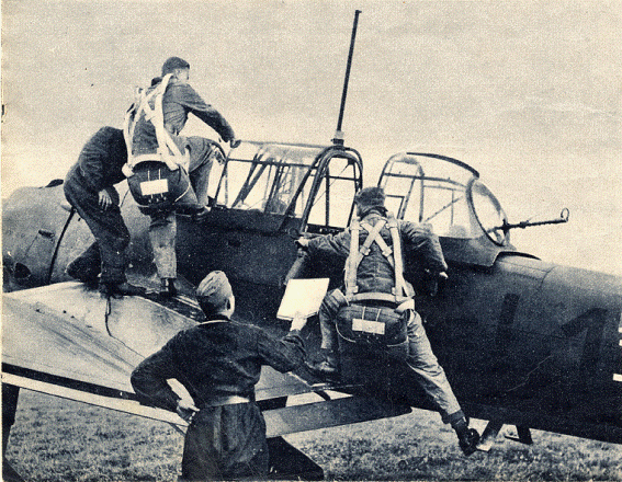The crew of one Ju 87B climbing to their machine............Poland 1939.