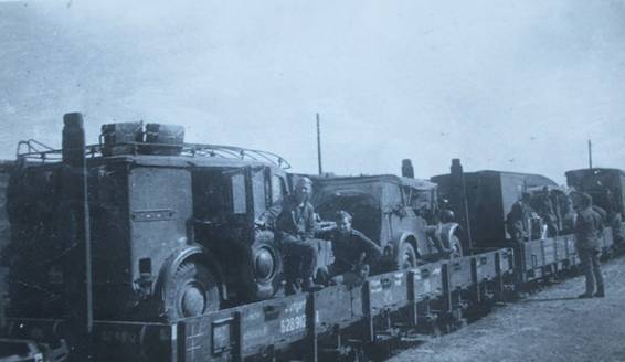 A Signal unit is deployed by rail. In the foreground one Horch Kfz 17