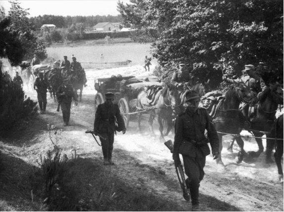 A horse-drawn artillery's unit after crossing a river in south Poland........