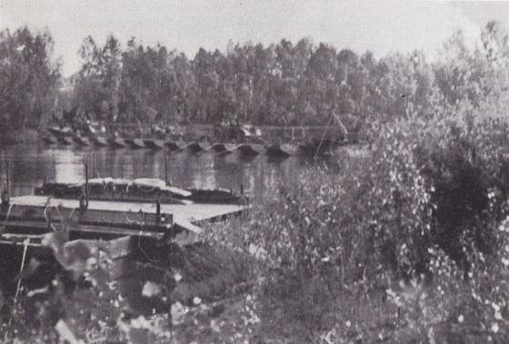 A battery of artillery  belonging to the AR 267  crossing the Bug river - June 22, 1941