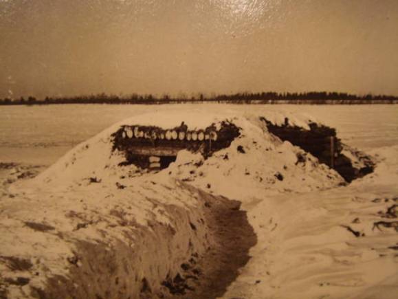 A shelter built of logs in the middle of nowhere - Winter 1941-42.