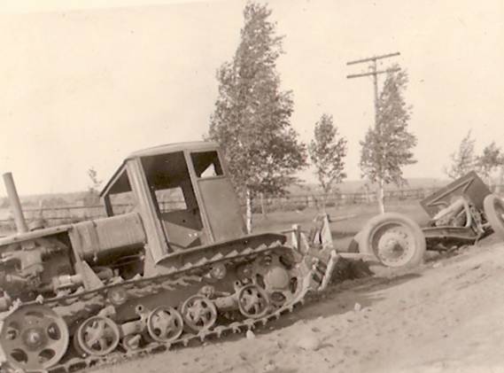 Soviet artillery tractor, disabled along with the gun somewhere in Ukraine - Summer 1941.