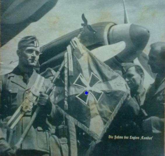 Banner of the Legion.......................<br />http://www.militaria321.com/auktion/5910676/Wehrarbeit---7---Juli-1939---DAF---KDF---Legion-Condor