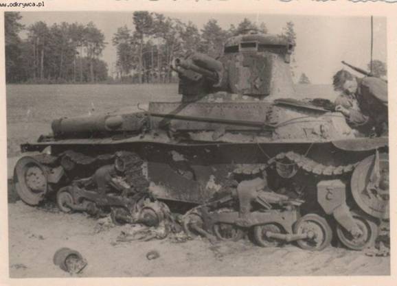 A burned down Pz Kw 35 (t) of the 1. Le Div......................