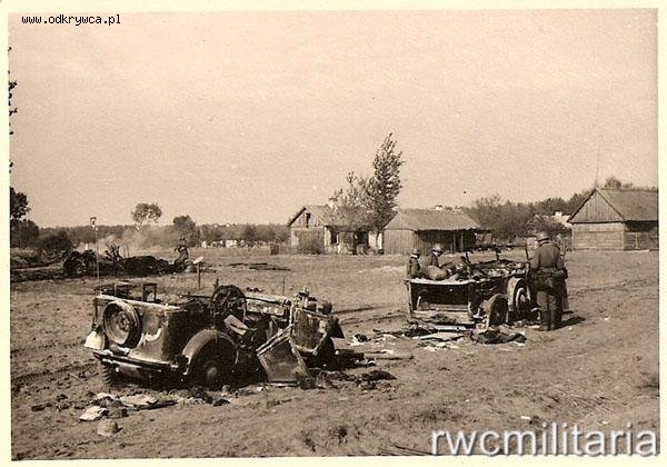 Two light vehicles (Pkw) badly damaged on a Polish route (mines, artillery, aerial attack?) ..............