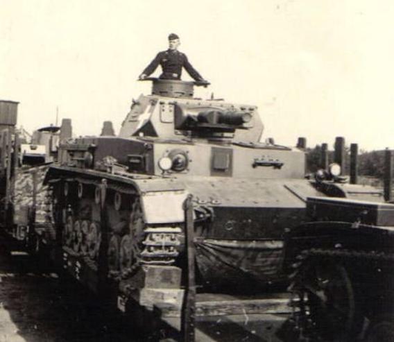 An armored unit being transported by rail, in the foreground a Pz Kw IV Ausf. A ....................