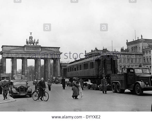 The railway wagon, pulled by a tractor after driving past the Brandenburg Gate on Unter den Linden................................