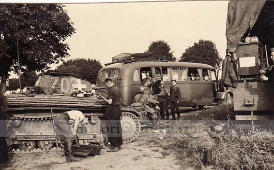 The crew of this Pz Kw IIb carrying out maintenance tasks........................