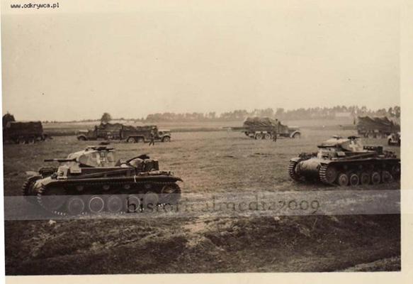View of some Pz Kw II Ausf. A/B/C in an assembly area during the Polish campaign of 1939; in the background a column of trucks Einheits-Diesel?? ..........................................