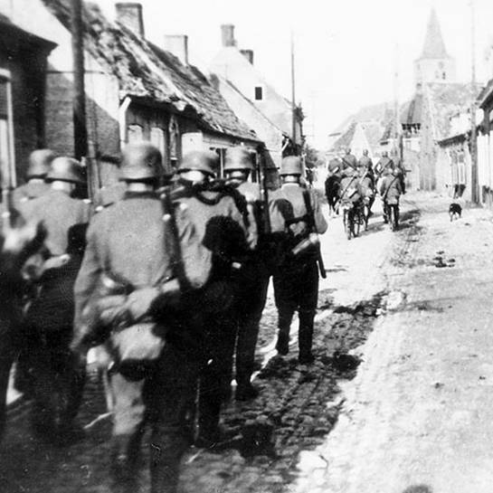 German troops marching past through Vinkt - May 29 1940.
