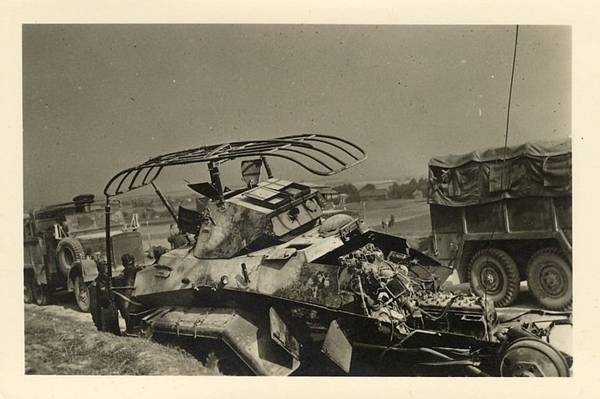 Funkwagen-Sd. Kfz. 232 (6 Rad) disabled by the Poles (pak, mines?) .........................