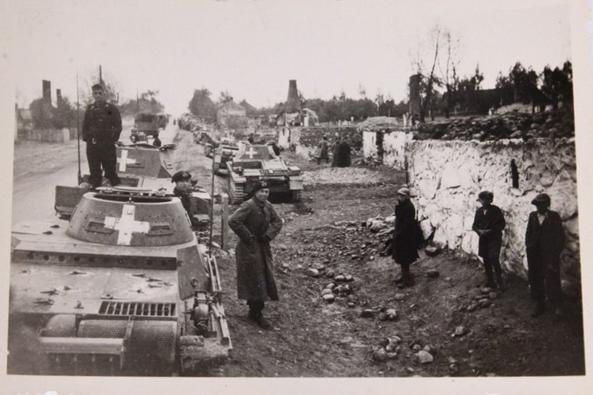 A German light tanks column during a rest in a destroyed Polish town....................<br />(Previous post)