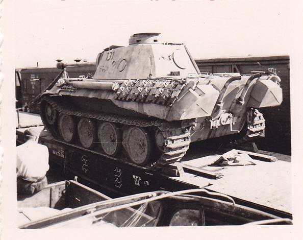 A Pz Kw V Ausf. D &quot;Panther&quot; Nº 131 of the Pz Abt 51 (see the  emblem of a panther on the turret) ready to be transported........................