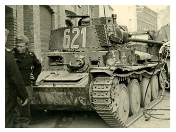A Pz Kw 38 (t) No. 621 blocking a congested route of advance - Belgium/France 1940 ..............................