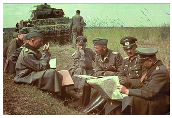 Meeting during the advance: Generaloberst Guderian (CO of Pz Gr 2) with Generalleutnant Hans-Jürgen von Arnim (CO 17. Pz), General der Artillerie Joachim Lemelsen (CO XXXXVII AK Mot) and Generalmajor Walther Kurt Joseph Nehring (CO 18. Pz). In the background a Pz Kw III................................