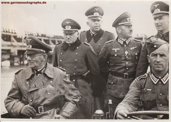 Generaloberst Freiherr von Weichs, who opened the famous bridge, traveling back from the north coast of the Danube with the commanders of the sappers battalions which took part in the construction - Belgrade May 1941................<br /><br />The officer at the far right - behind the driver - is Gerhard Feyerabend (Ia of 2. AOK).
