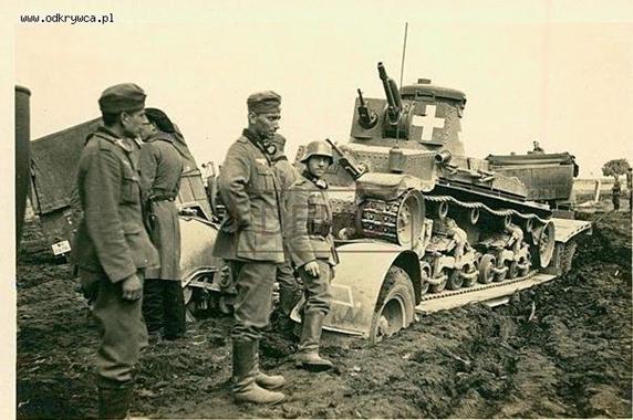 A Sd. Ah. 115 with a Pz Kw 35 (t) caught in soft ground - Poland 1939...........................................