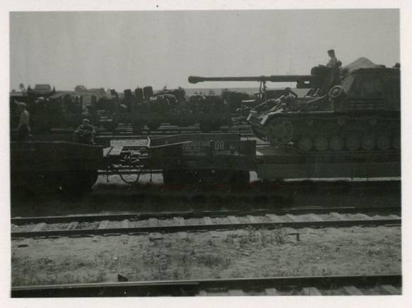 A Sd.Kfz.164 Hornisse of one Schwere Panzerjäger Abteilungen (Heavy tank hunter detachment) being moved by rail toward the front....................................