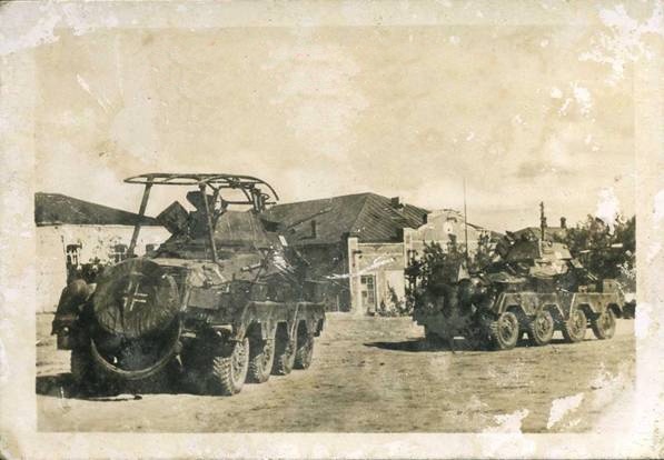 Light armored reconnaissance vehicles (panzerspähwagen) moving to the front ..............